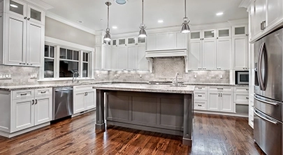 Modern Kitchen with Stainless Steel Appliances and White Cabinetry